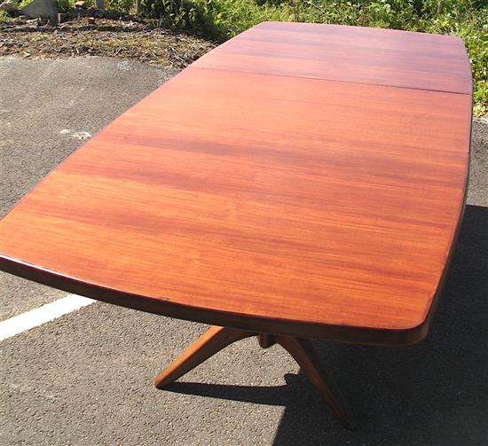 A Gordon Russell Burford Extending Dining Table and Eight Matching Chairs,